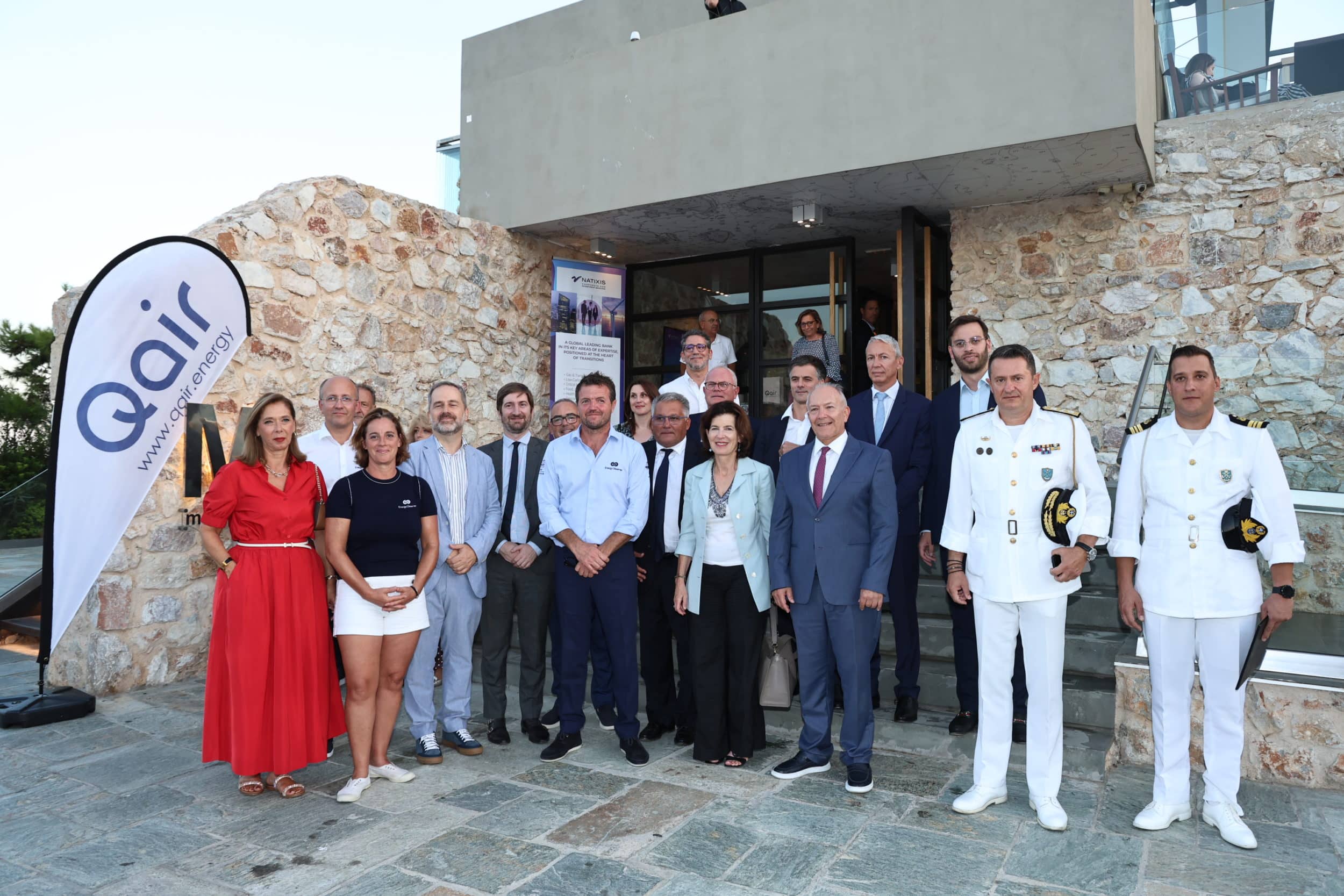 Representatives of Energy Observer, Qair, Natixis, and Greek authorities in front of the Moorings, Astir Marina