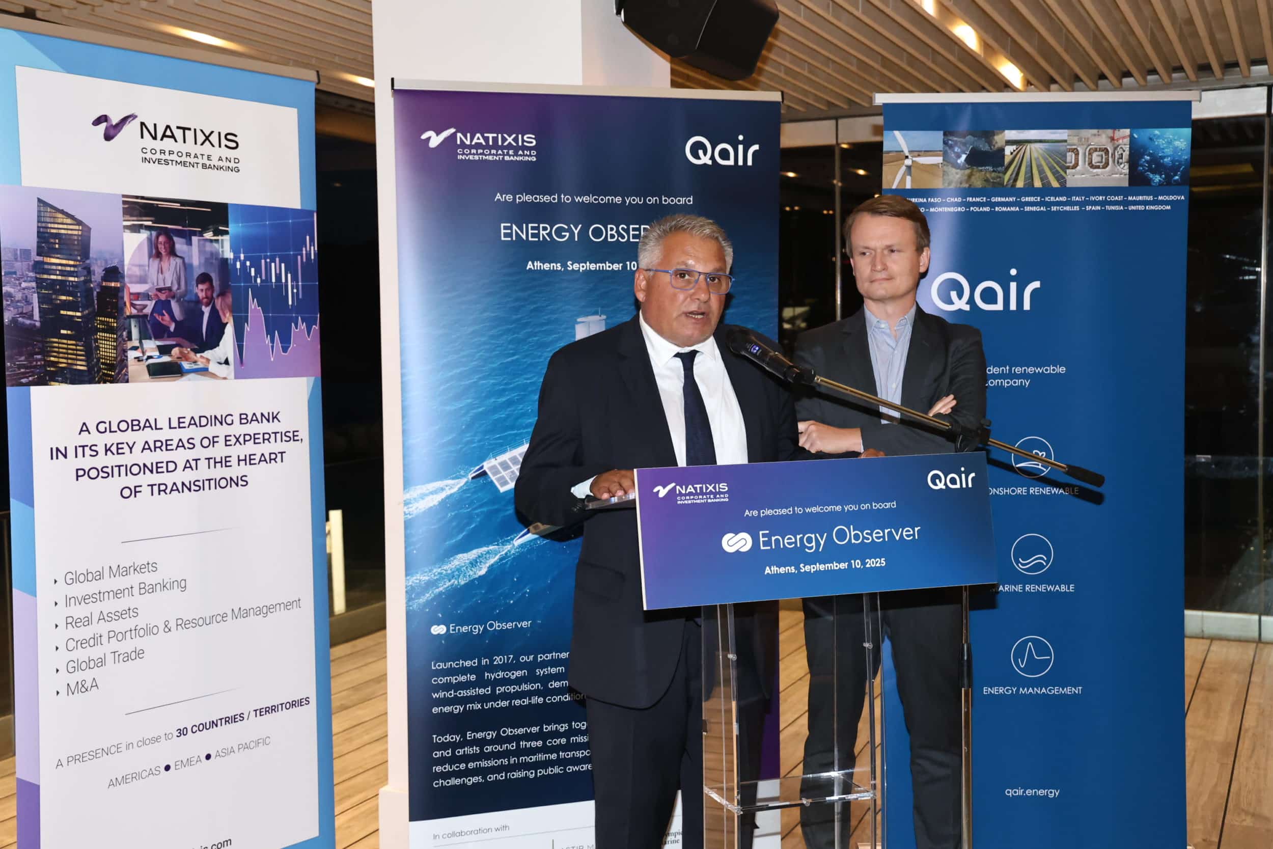 Frank Valavanis, Greece Country Director at Qair, delivering a speech.